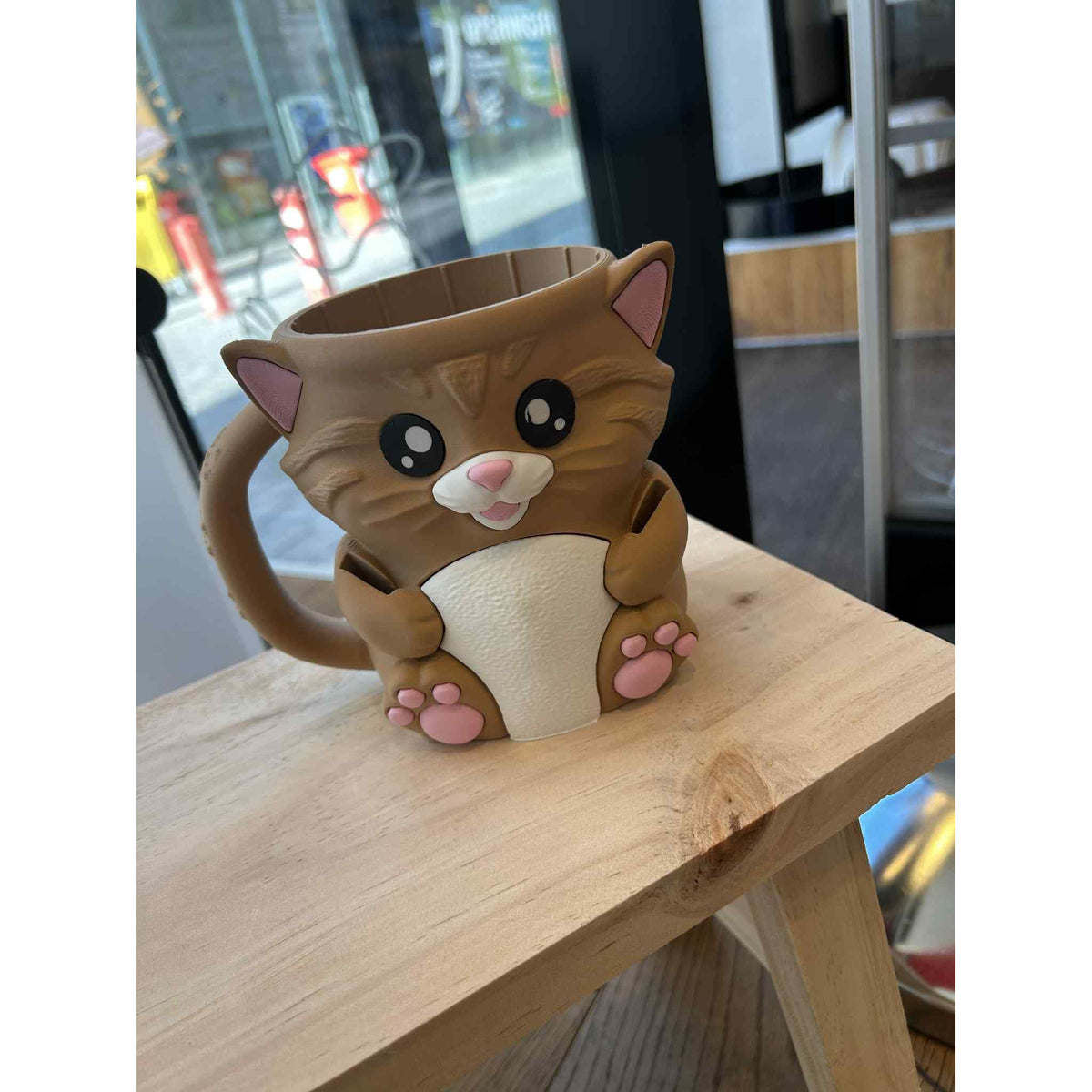 IJsbekerhouder - Kat - Het Oekedoeleke