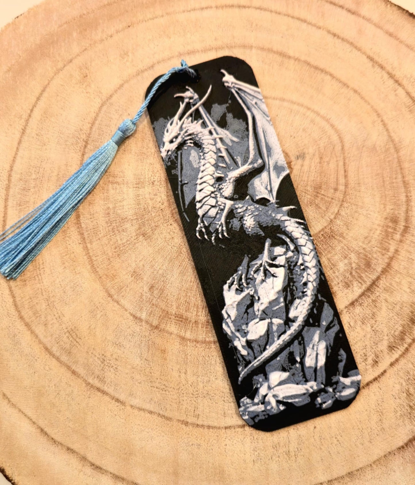 Bladwijzer - Draak op rots