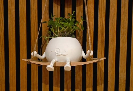 Mr. Monokel op Schommel - Het Oekedoeleke